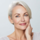 Middle-aged woman fresh face beautiful glowing healthy skin