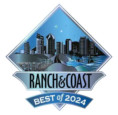 Ranch & Coast Best of 2024 award badge, featuring a stylized skyline and coastal imagery