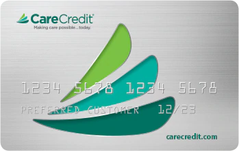 Image of a CareCredit card displaying the CareCredit logo, stylized leaf design, and placeholder card details with the website carecredit.com