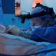 Dr. Tyler Frew performing breast augmentation surgery with inframammary fold incision placement and implant pocket dissection in the operating room
