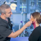 Dr. Richard Balikian showing where facelift incisions are hidden around the ear and hairline.